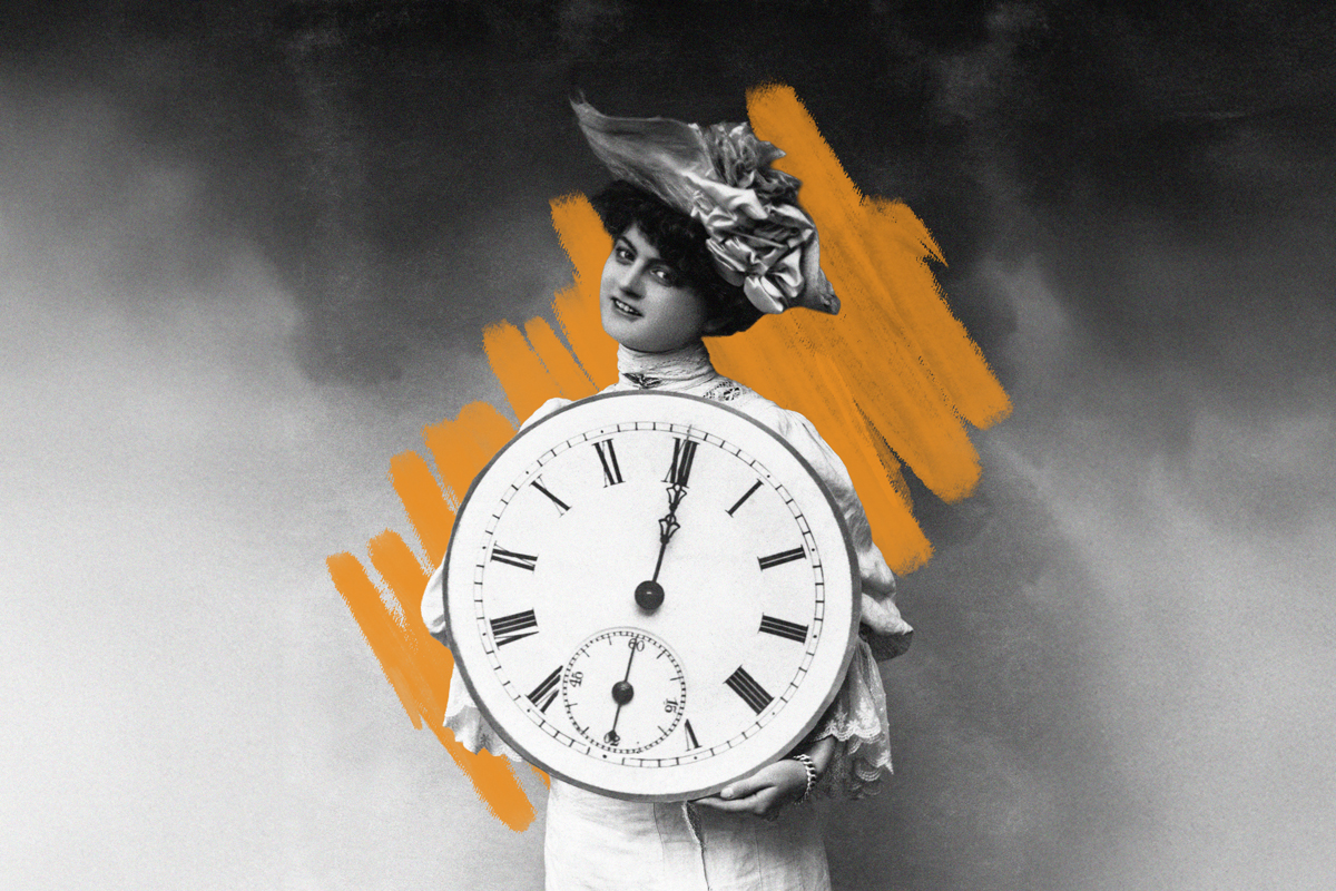 Woman holding clock