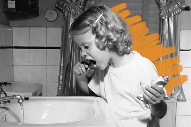 Young girl brushing her teeth