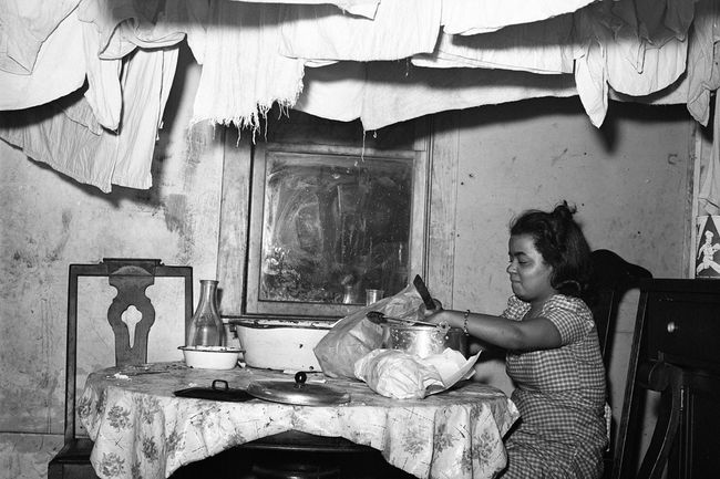 Preparing dinner, circa 1939