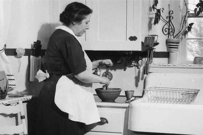 Woman using a hand mixer