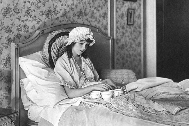 Woman wearing a nightcap