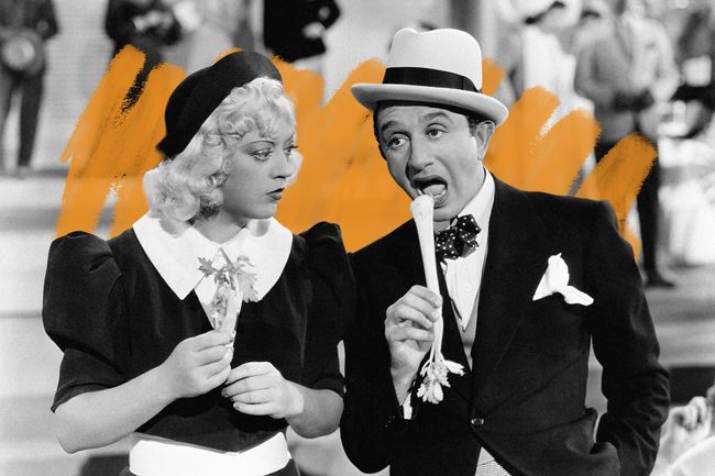 Eating celery in a scene from the movie "Cain And Mabel", 1936