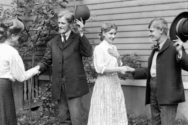 Two couples greeting, 1905
