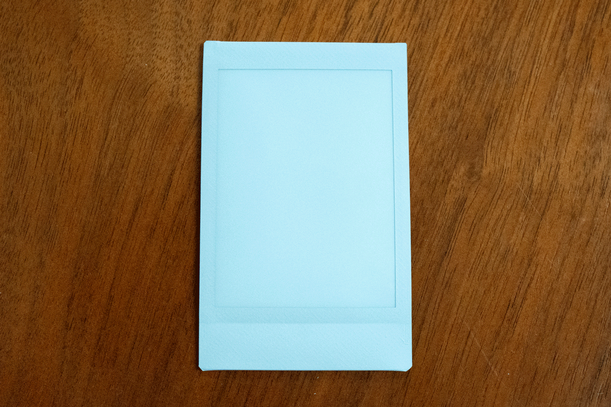 A gif of a developing Polaroid photo