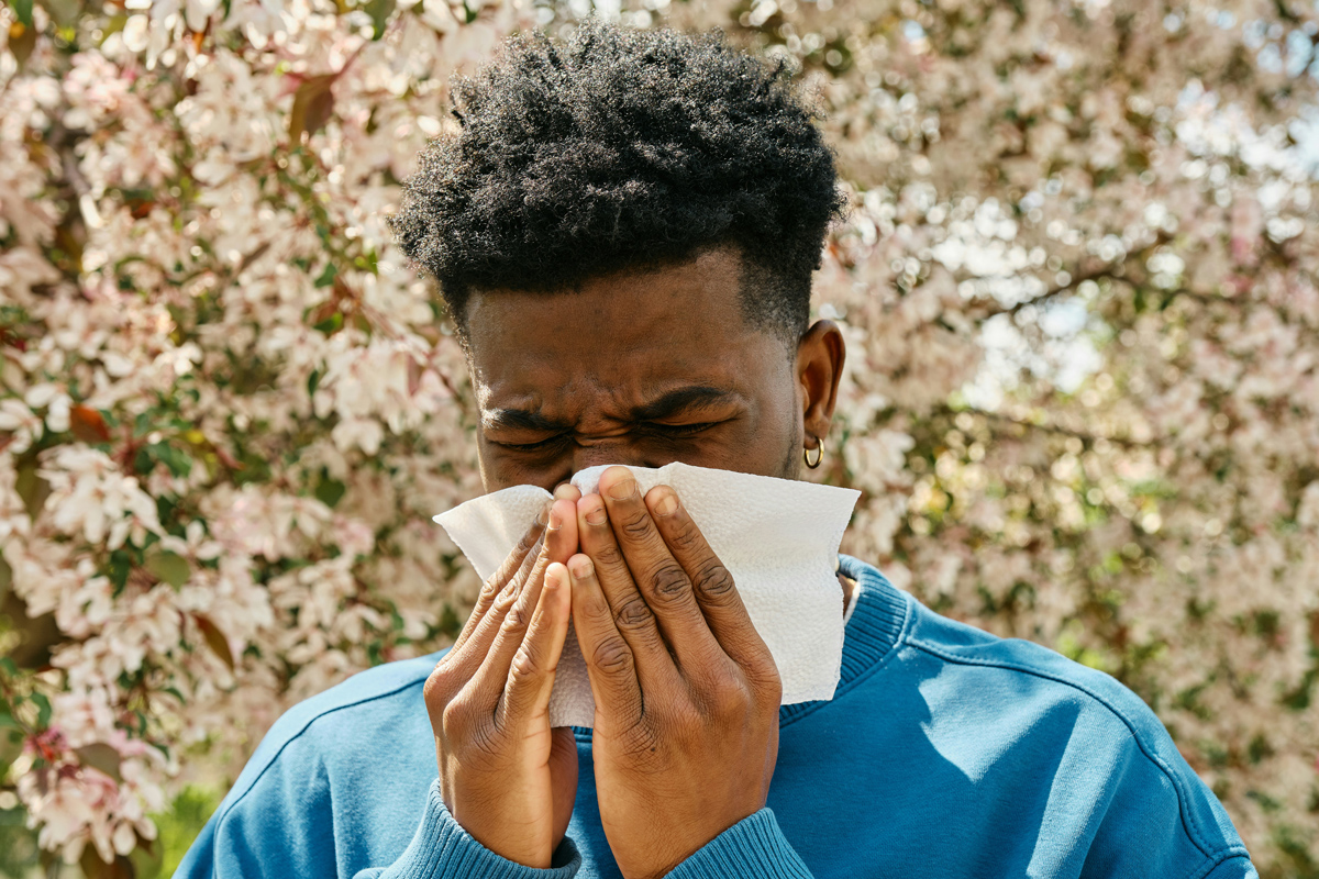 Person blowing their nose