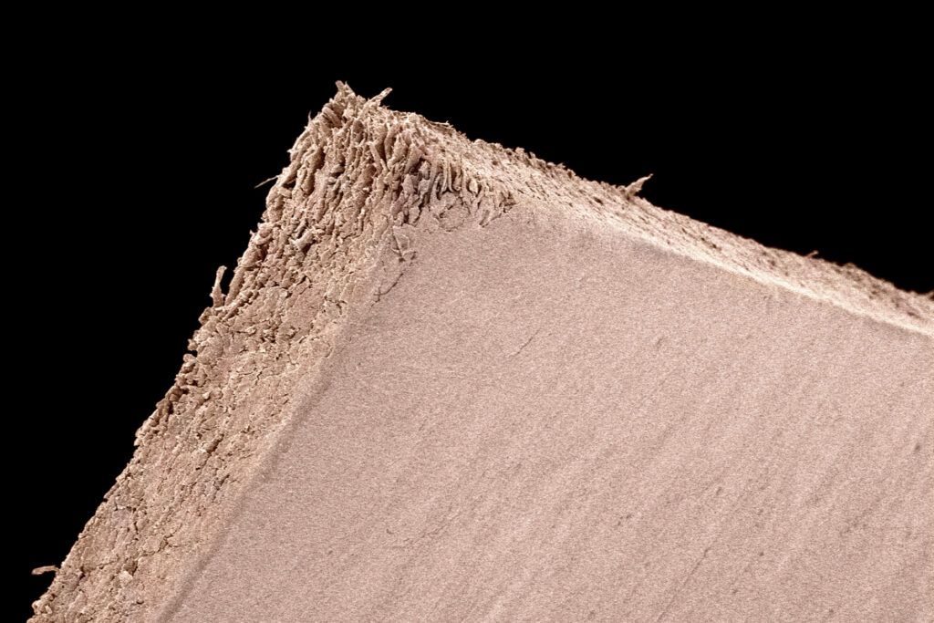 Extreme close-up view of a paper edge