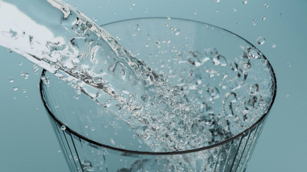 Water pouring into a glass