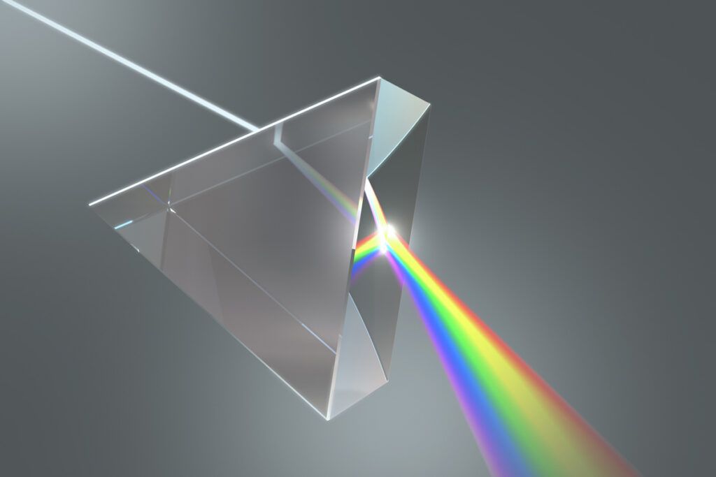 A prism refracting a rainbow of color