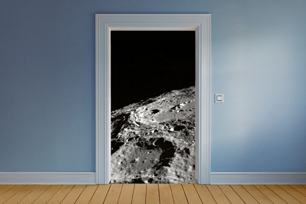 The moon's surface right outside a window