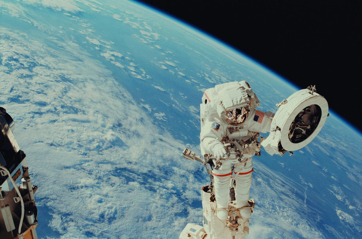 Astronaut orbiting Earth
