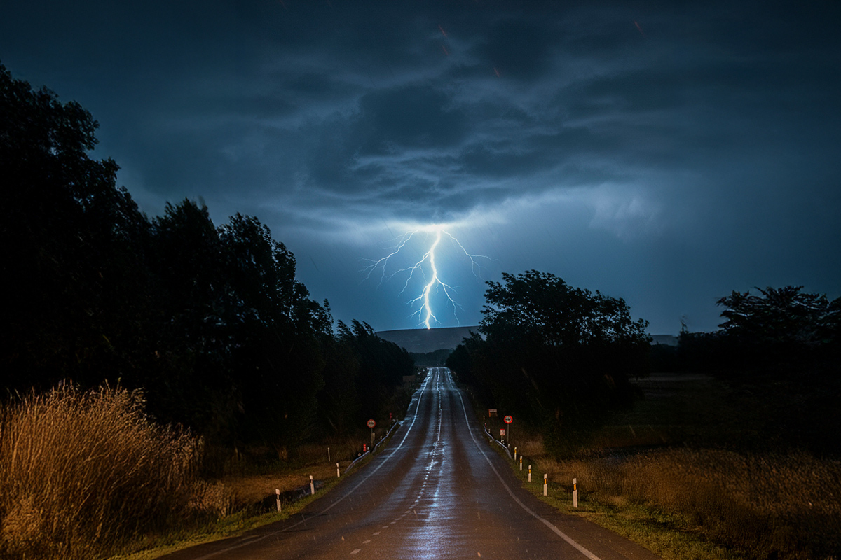 Lightning strike over a highway