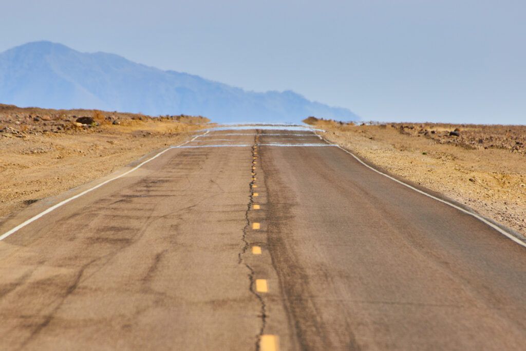 A desert road with heat shimmer