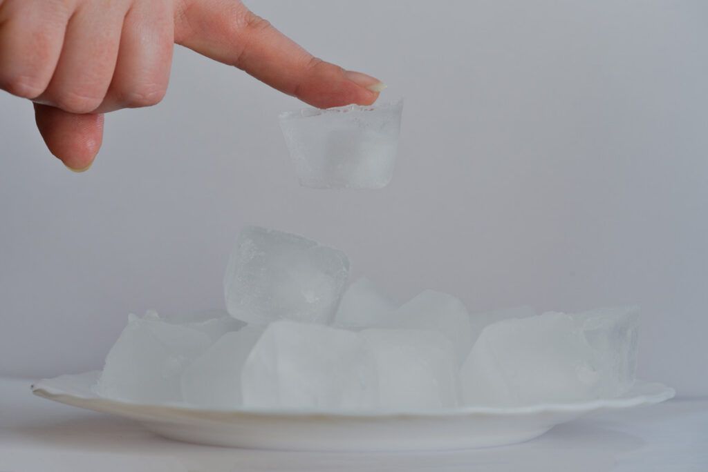Ice cube stuck to finger