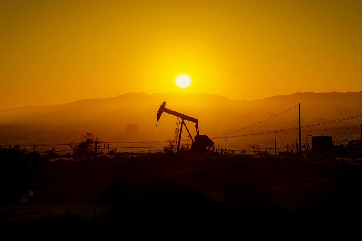 Oil rig at sunset