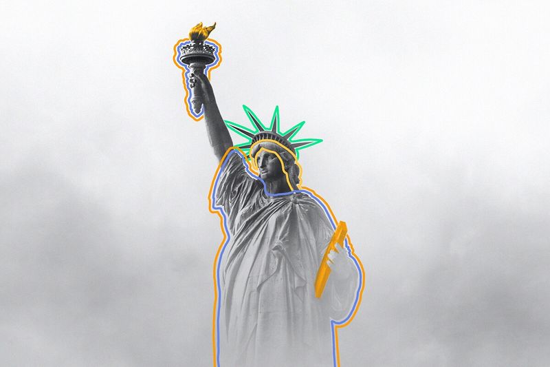 The Statue of Liberty against clouds