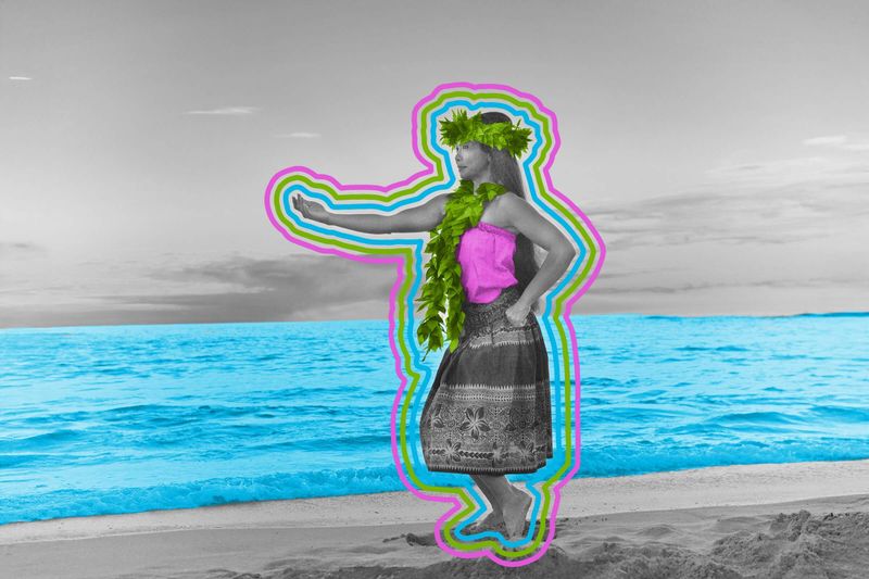 Hawaiian hula dancer dancing on the beach of the tropical Hawaiian islands