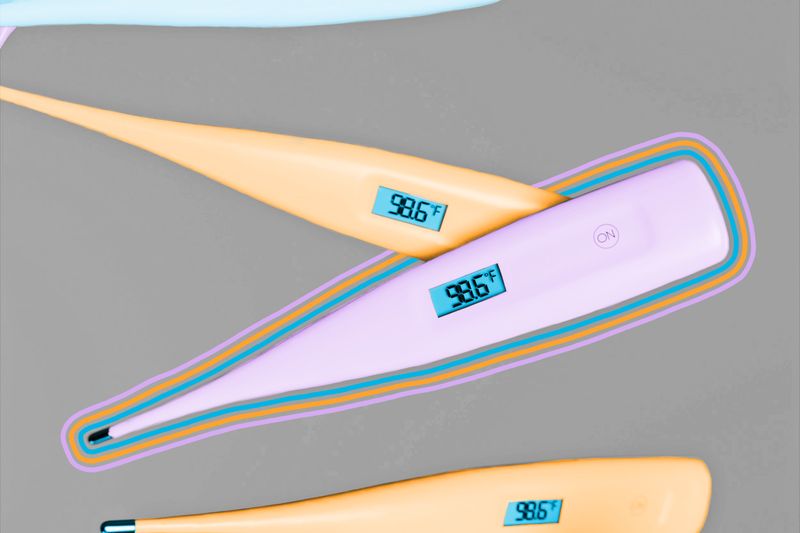 Group of thermometers reading 98.6 degrees Fahrenheit