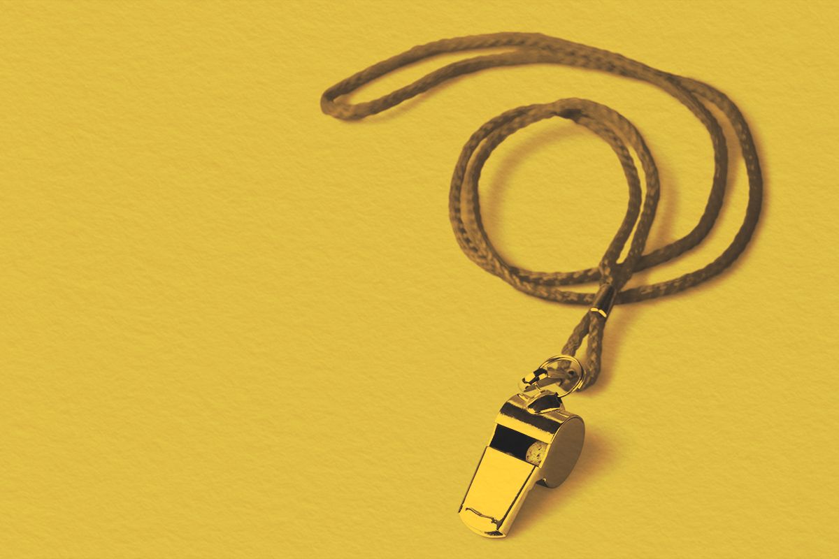 Sports whistle with a lace