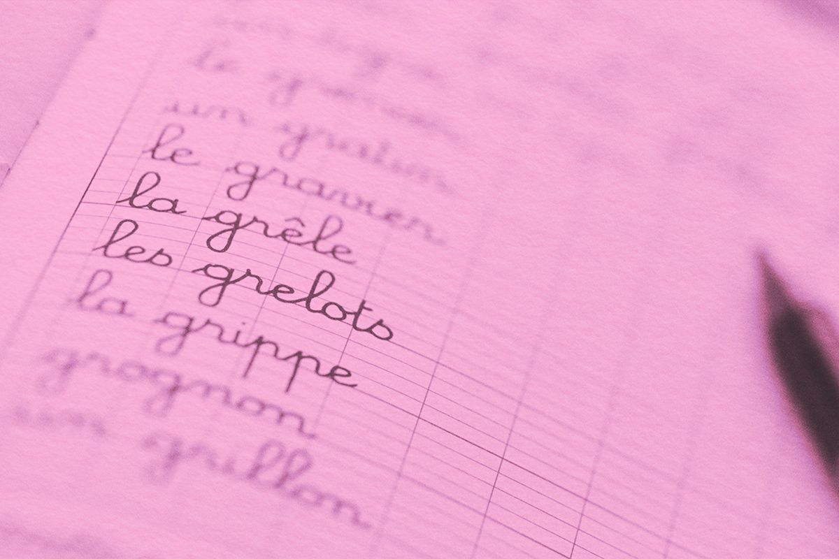 Notebook with list of written vocabulary in French cursive