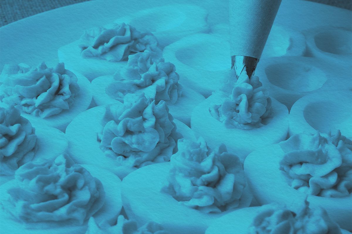 Piping being done for deviled eggs